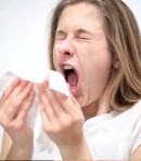Sneezing woman